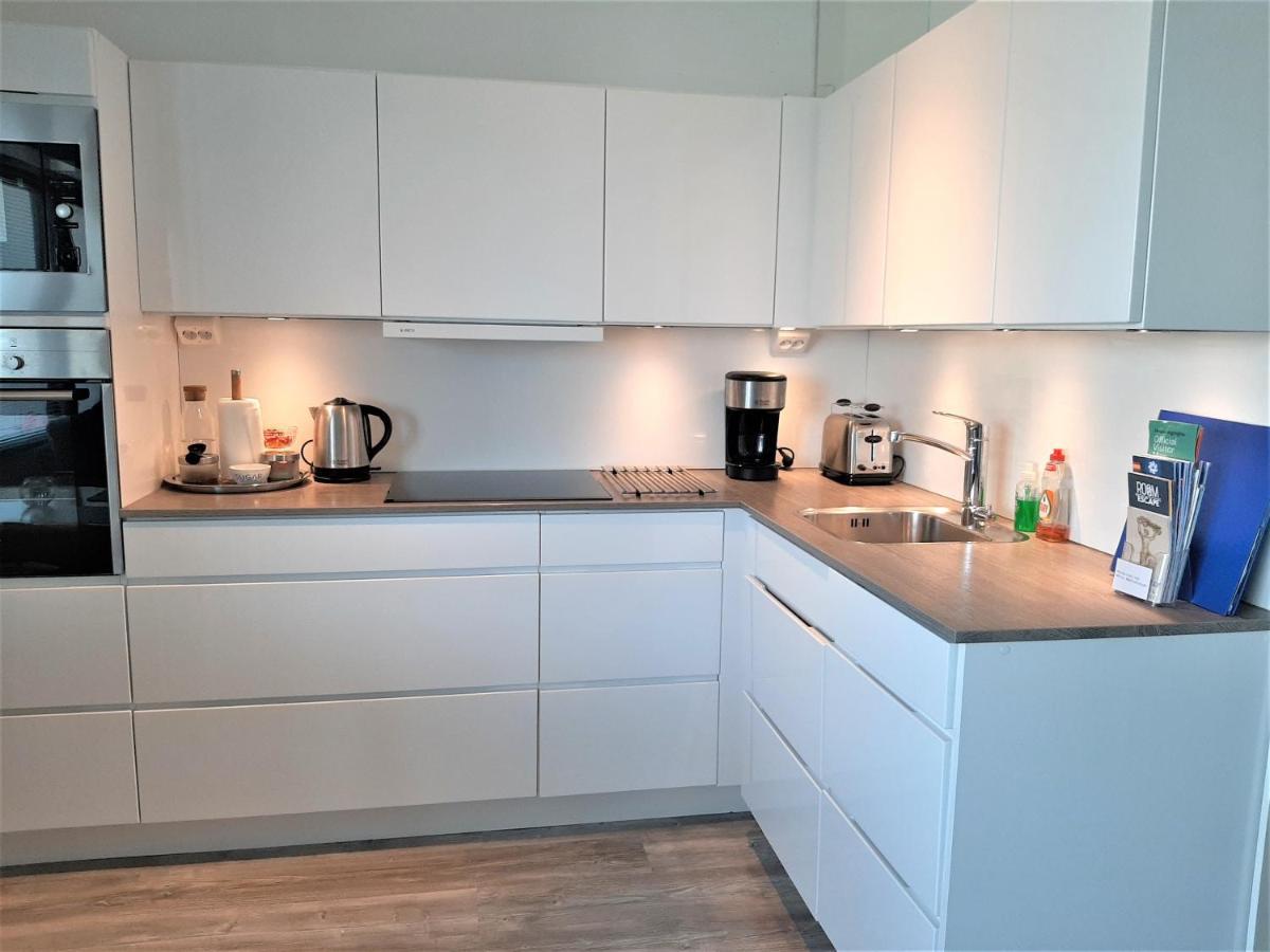 Seaside Downtown Apartment With Private Parking Helsinki Bagian luar foto
